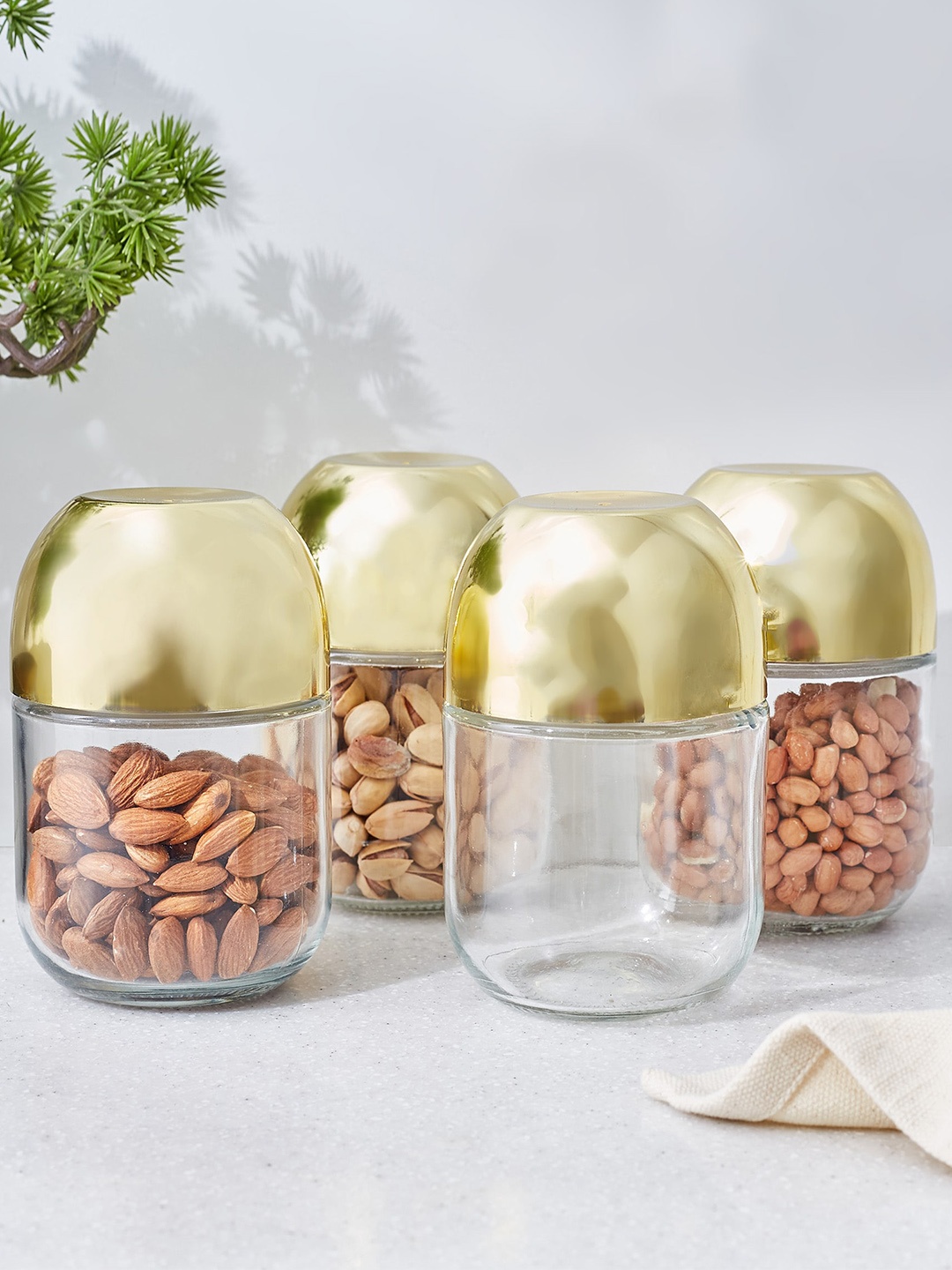 

Home Centre Travis Devon Yellow & Transparent 4-Pieces Glass Canisters 350ml