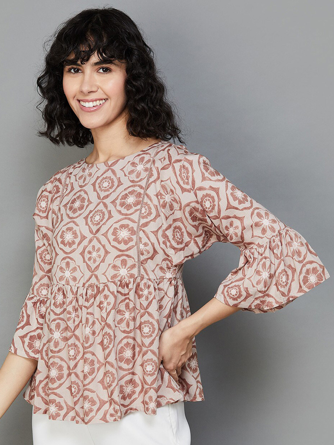 

Colour Me by Melange Ethnic Motifs Printed Bell Sleeves Peplum Top, Beige