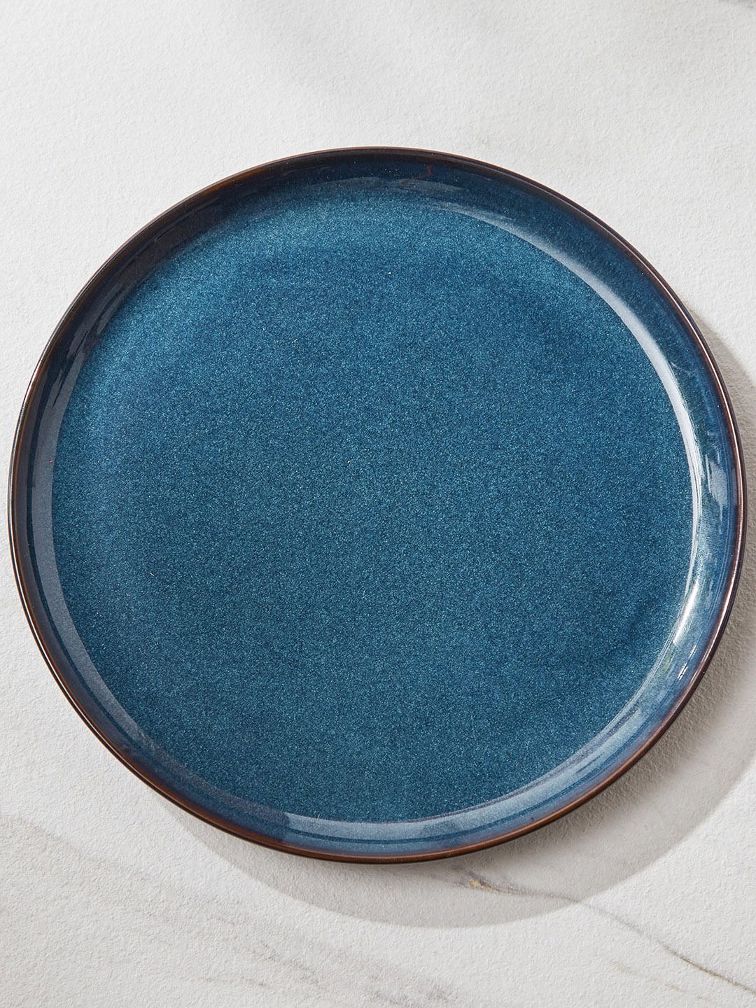 

Home Centre Capiz Indi Blue Serving Dish