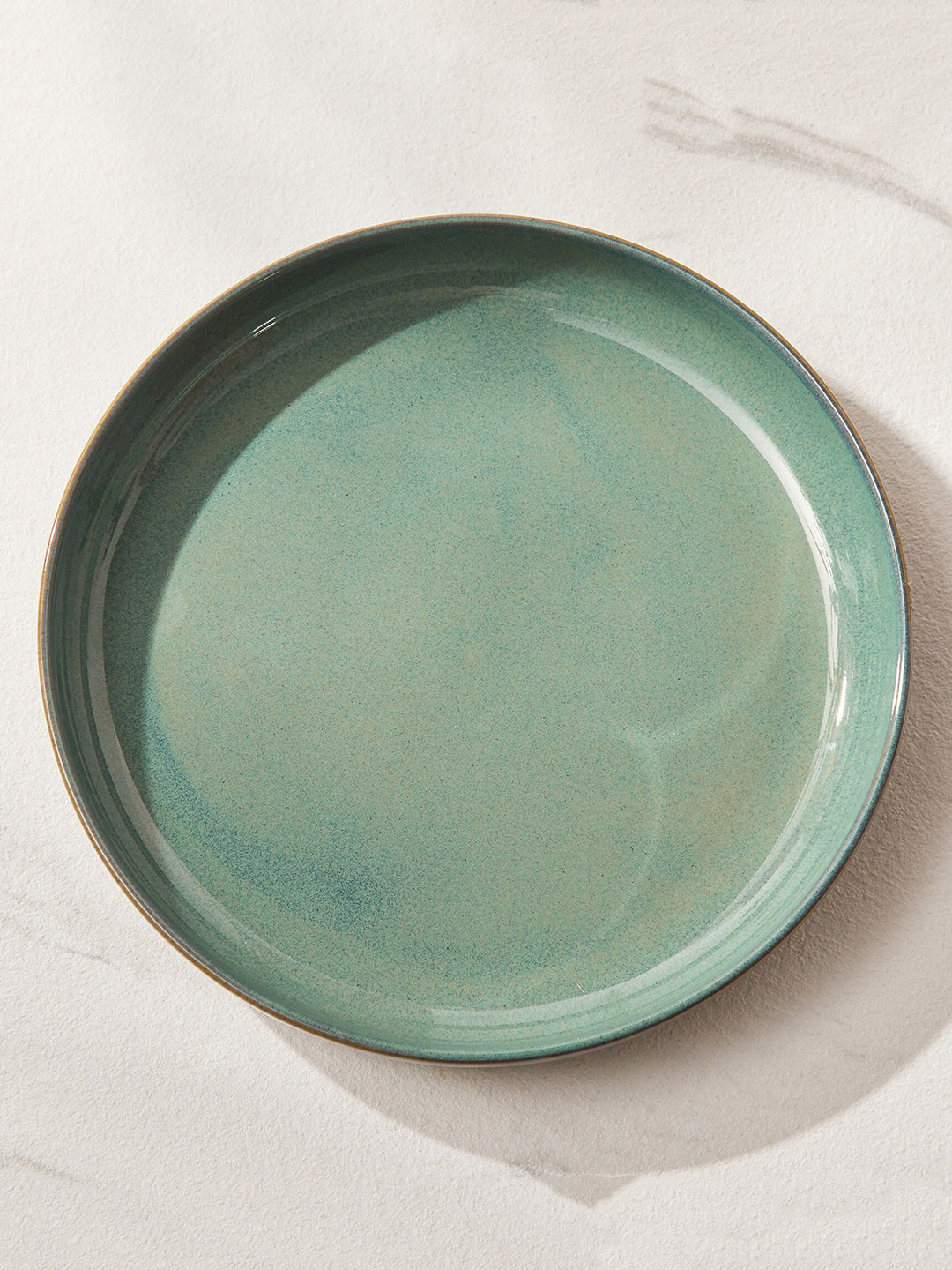 

Home Centre Capiz Verde Green Porcelain Deep Plate