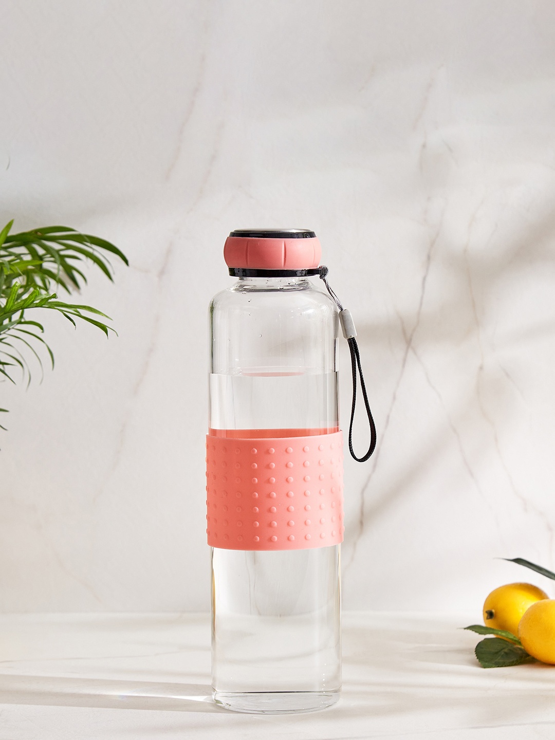 

Home Centre Atlantis Bowen Pink Glass Water Bottle with Pouch 700 ML