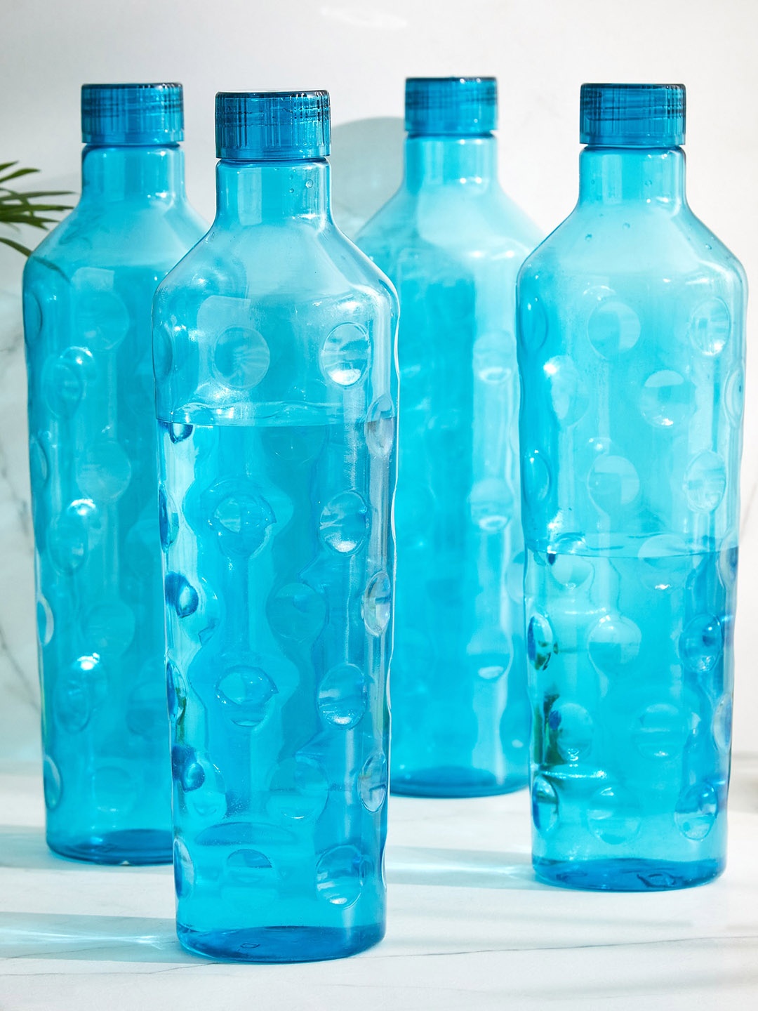 

Home Centre Corsica 4 Pcs Blue Fridge Bottles 950 ML