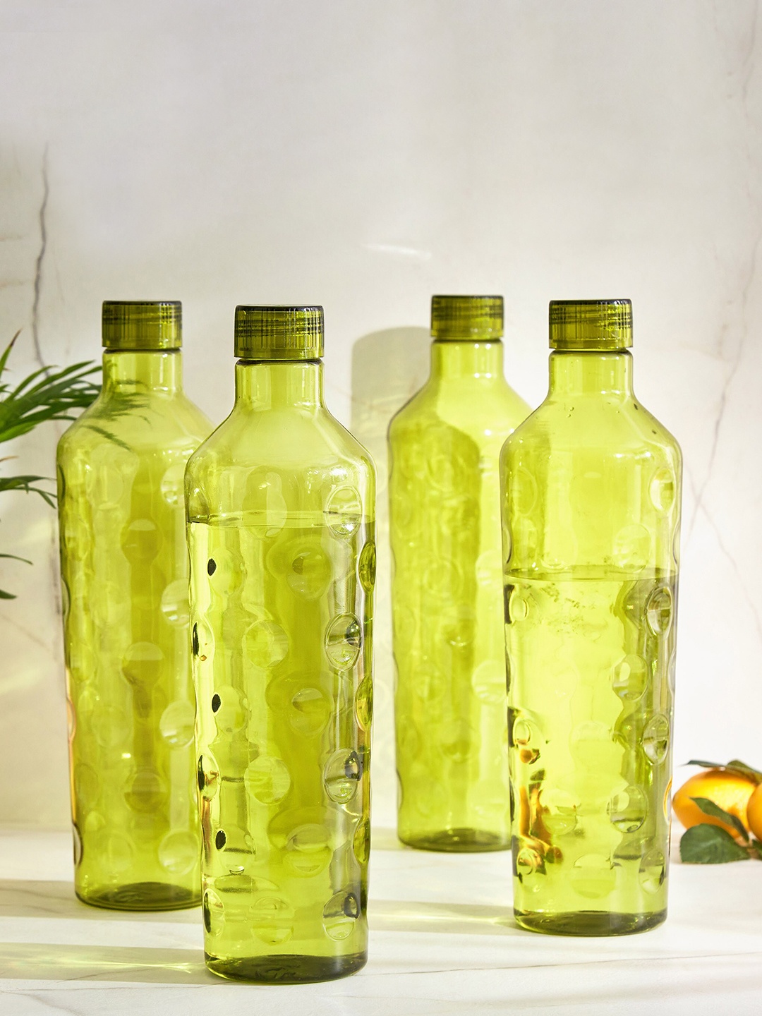 

Home Centre Corsica 4 Pcs Fluorescent Green Fridge Bottles 950 ML