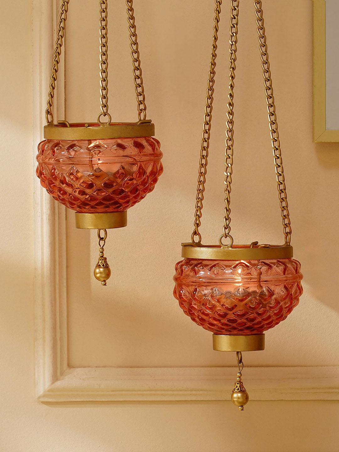 

Home Centre Peach & Brown 2 Pieces Textured Glass Hanging Votive Holders