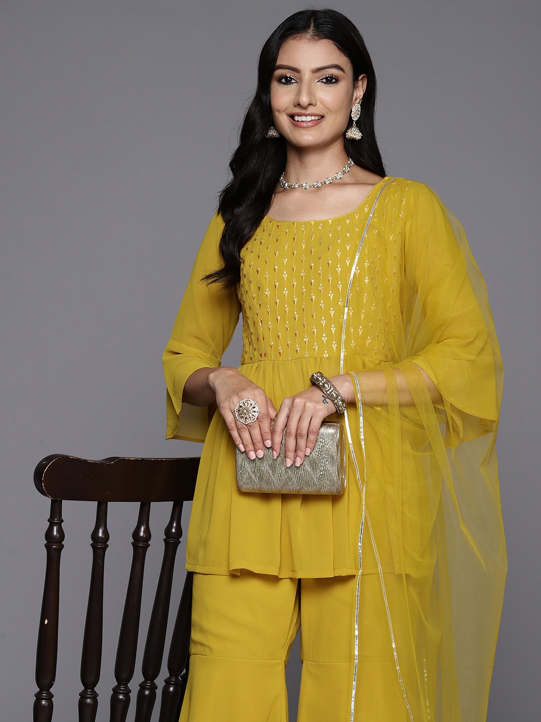 

Libas Women Embroidered A-Line Sequinned Kurti with Sharara & With Dupatta, Mustard