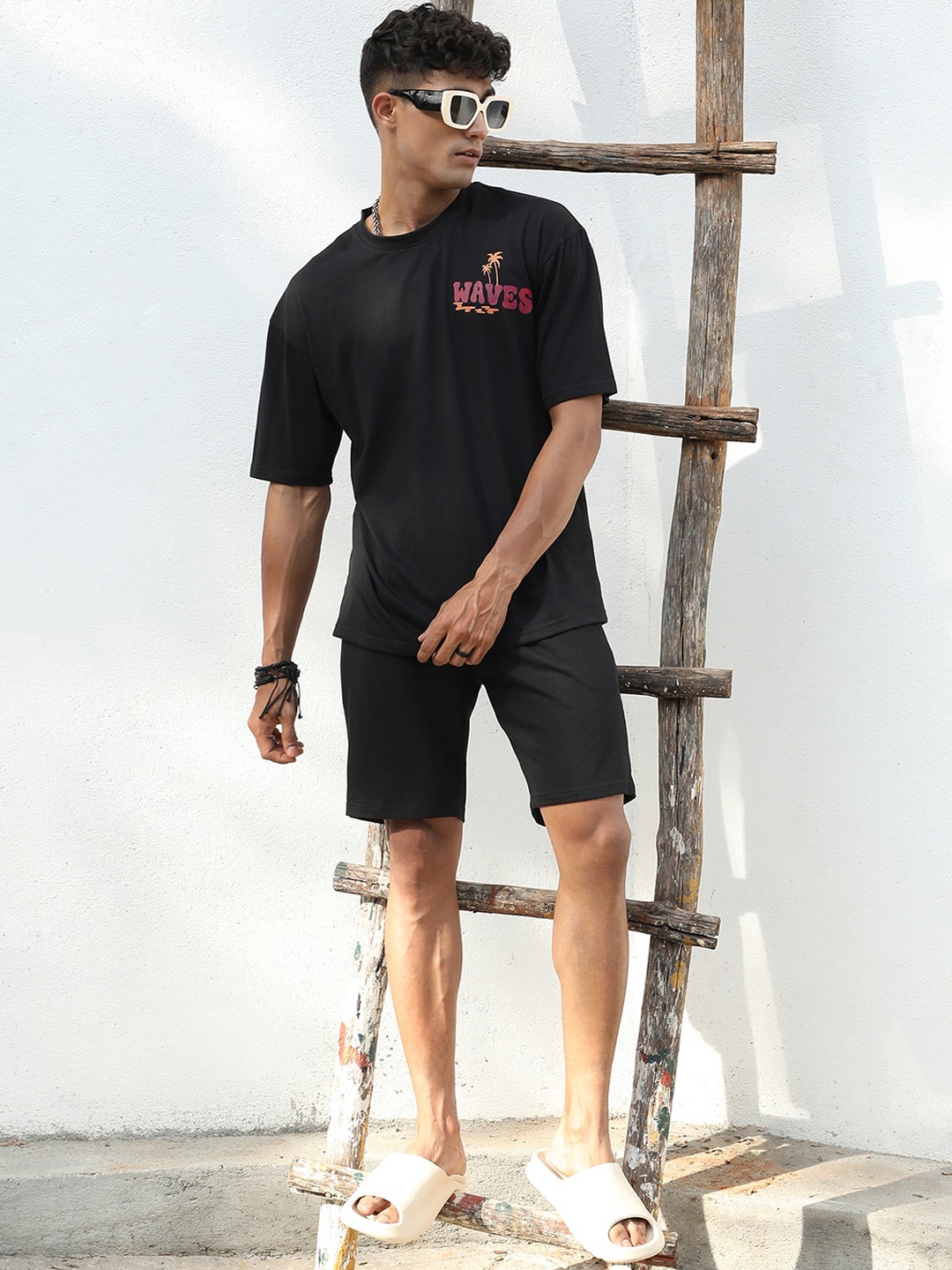 

Campus Sutra Black Typography Printed Round-Neck T-Shirt With Shorts Co-Ords