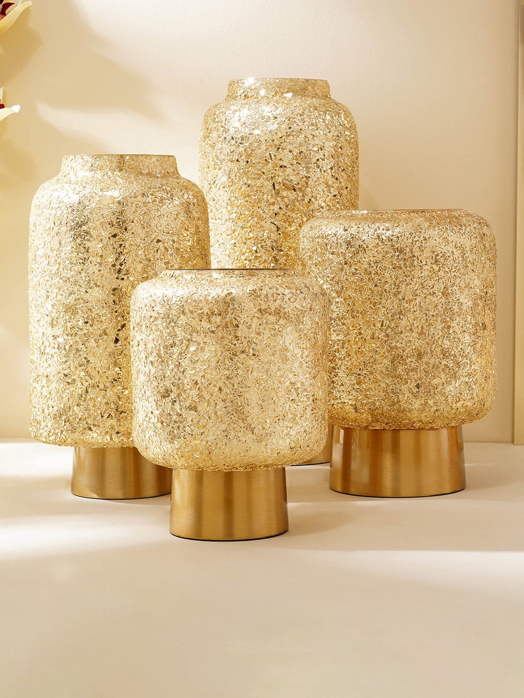 

Home Centre Festivora Egon Gold Toned textured Glass Vases