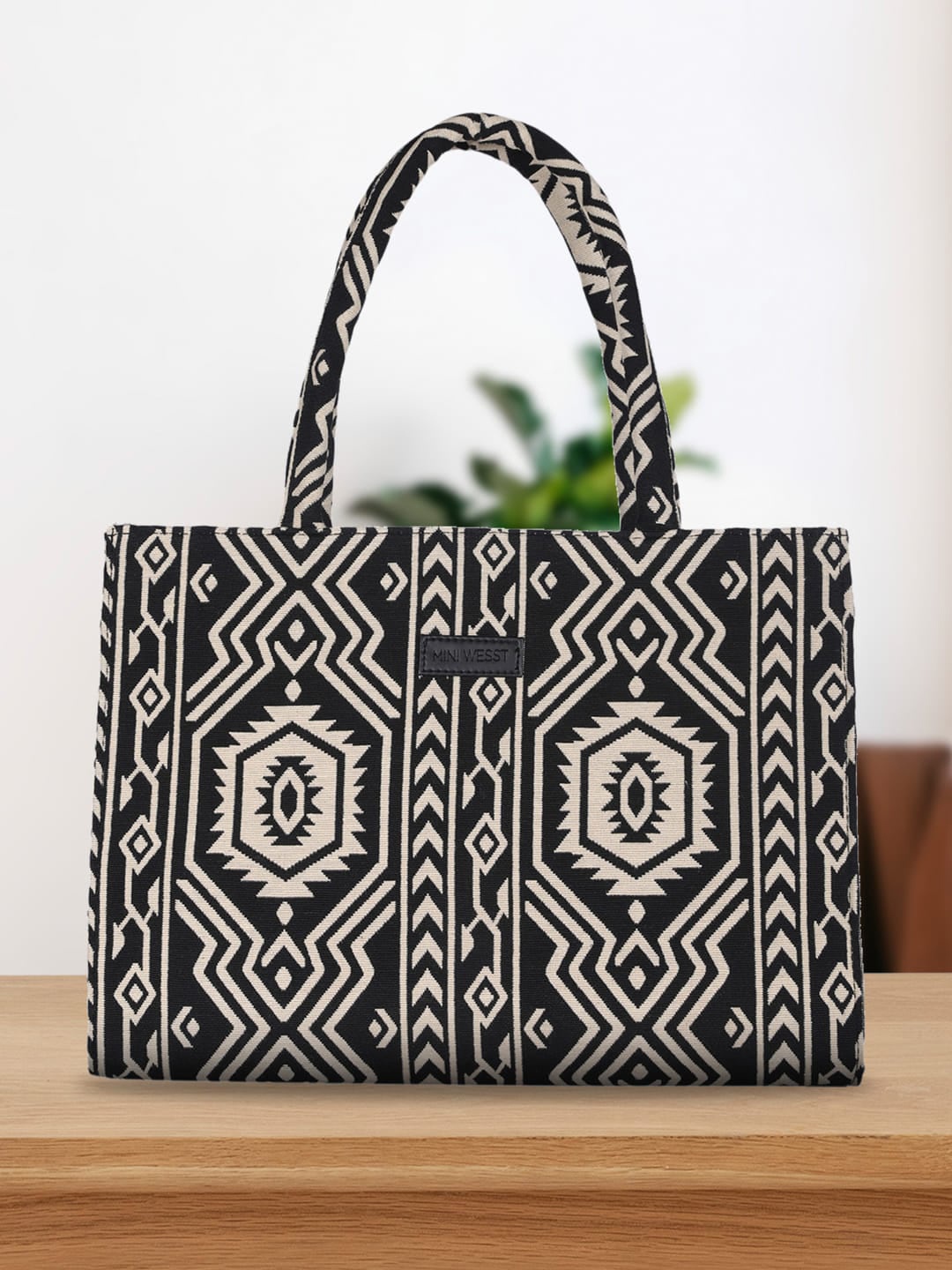 

MINI WESST Ethnic Motifs Printed Structured Handheld Bag Up To 16 Inch, Black