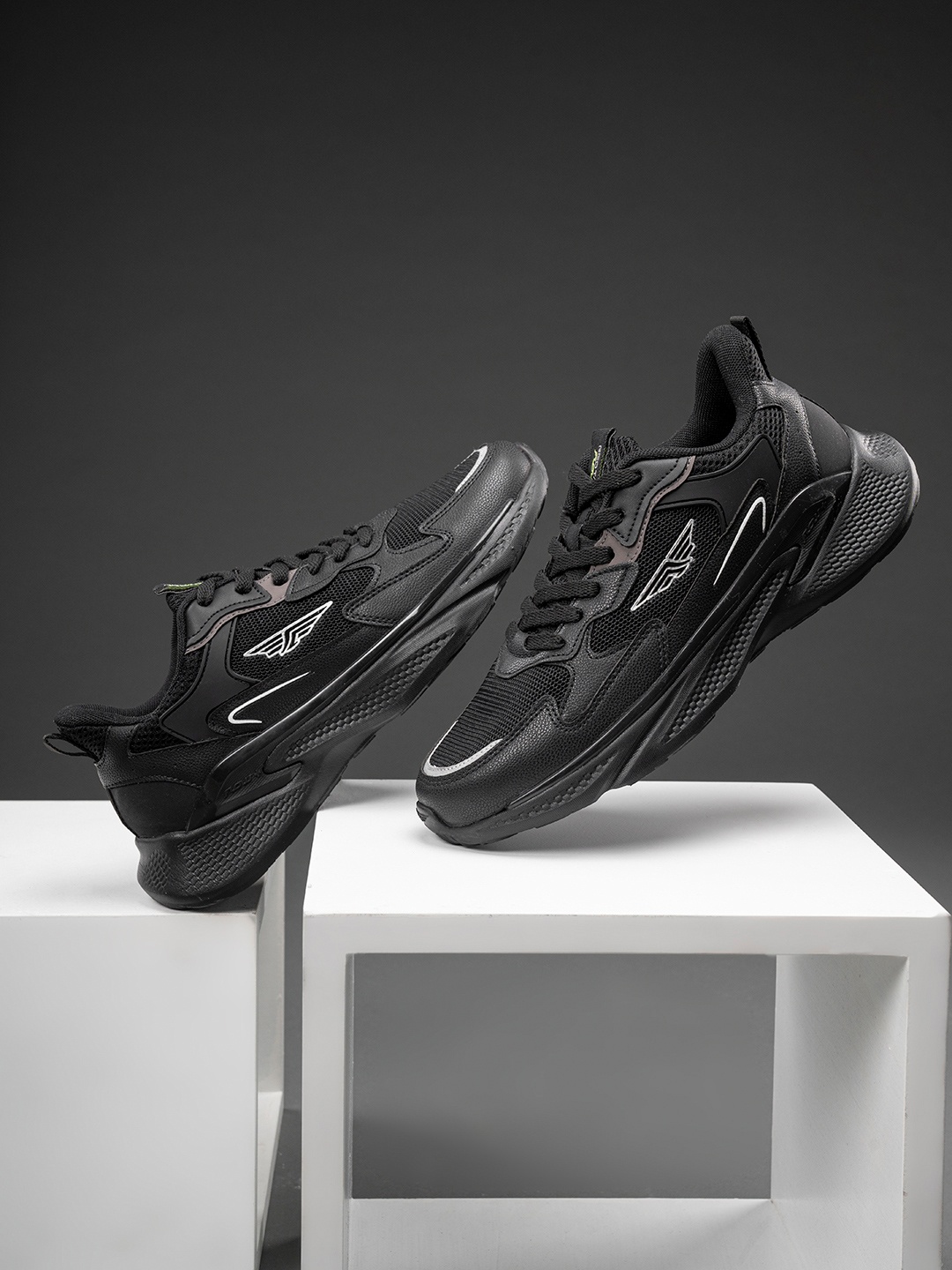

Red Tape Men Textured Slip Resistance Surface Grip Sneakers, Black