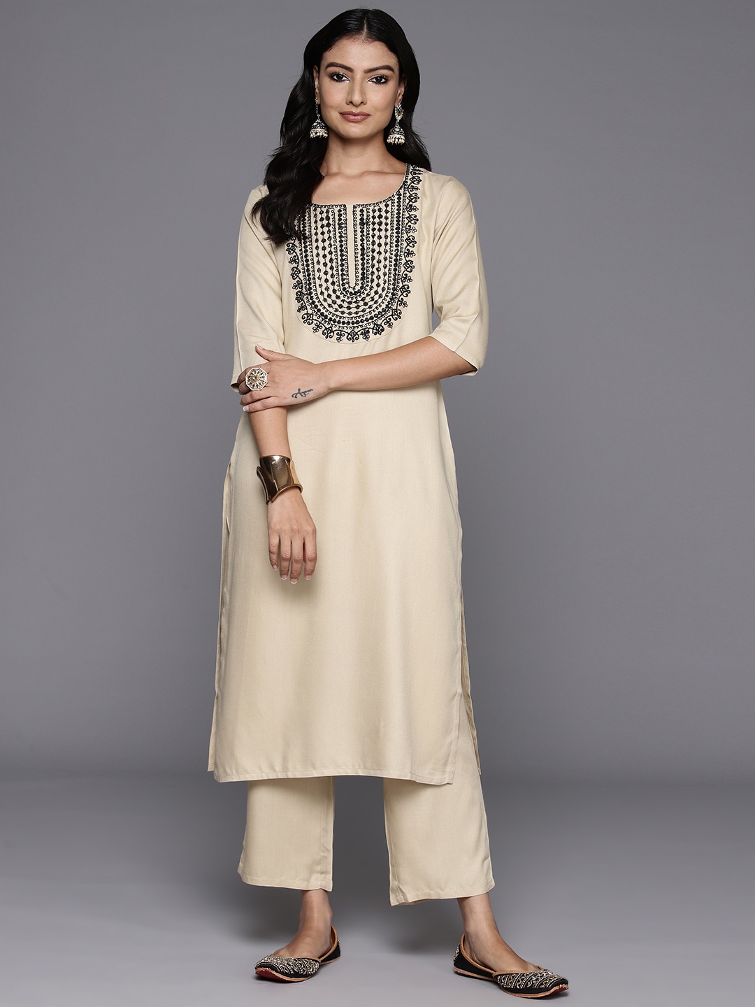

Libas Women Ethnic Motifs Yoke Design Regular Sequinned Kurta with Trousers, Beige