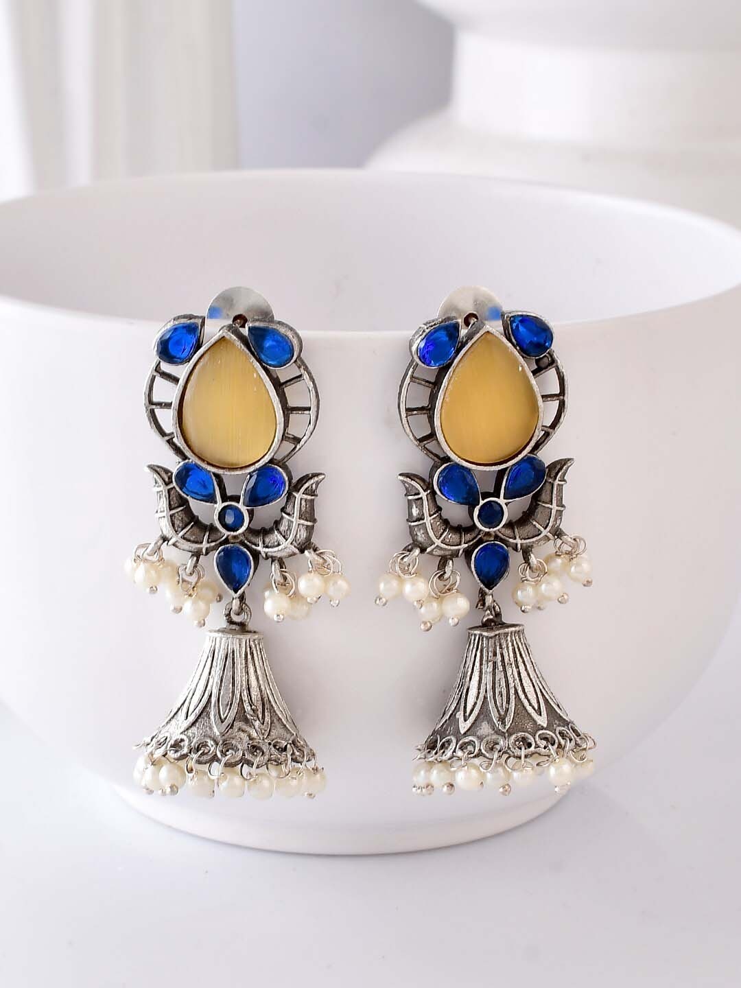 

DASTOOR Silver-Plated Dome Shaped Jhumkas