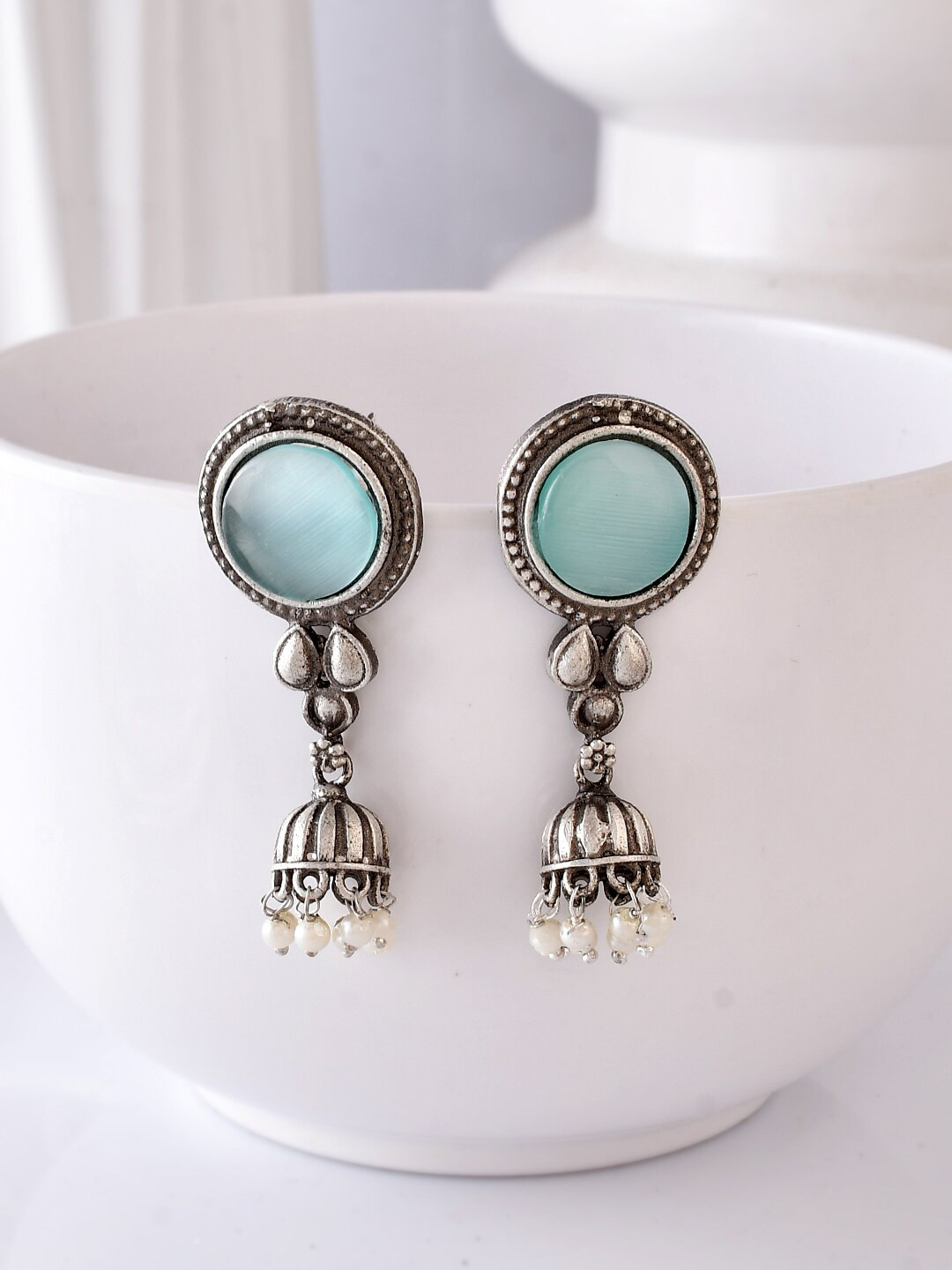 

DASTOOR Silver-Plated Beaded Contemporary Jhumkas
