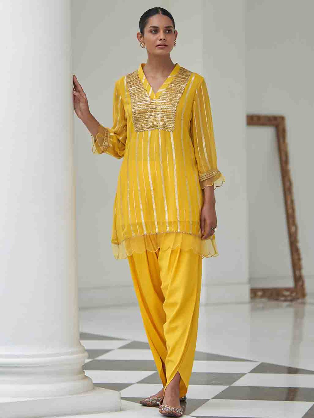 

Lakshita Striped Regular Work Sequinned Kurti with Dhoti Pants, Yellow