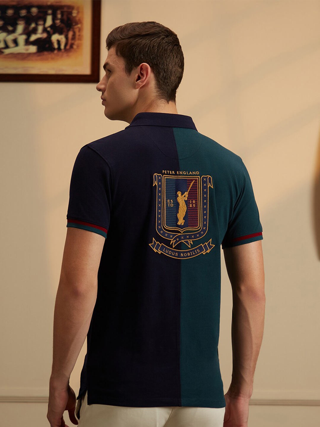 

Peter England Casuals Graphic Printed Polo Collar Slim Fit Cricket Inspired T-shirt, Green