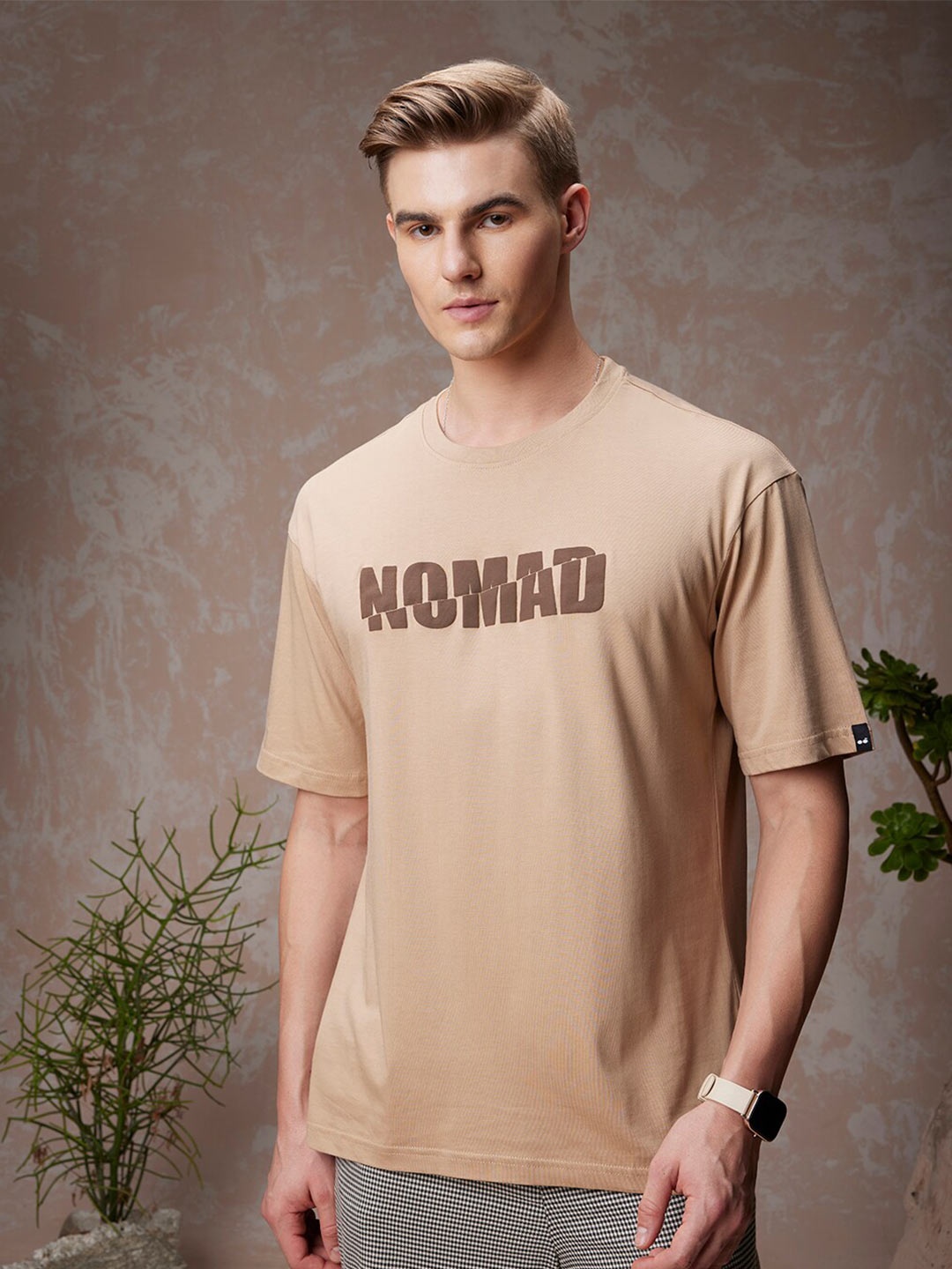 

Bewakoof American Pima Nomad Typography Oversized T-shirt, Brown