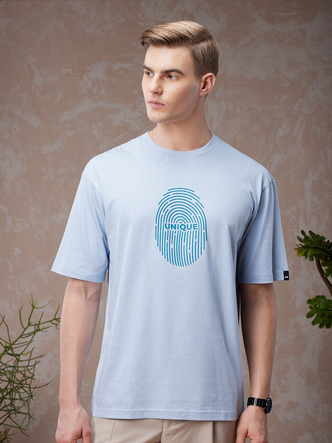

Bewakoof American Pima Men's Blue Unique Graphic Printed Oversized T-shirt