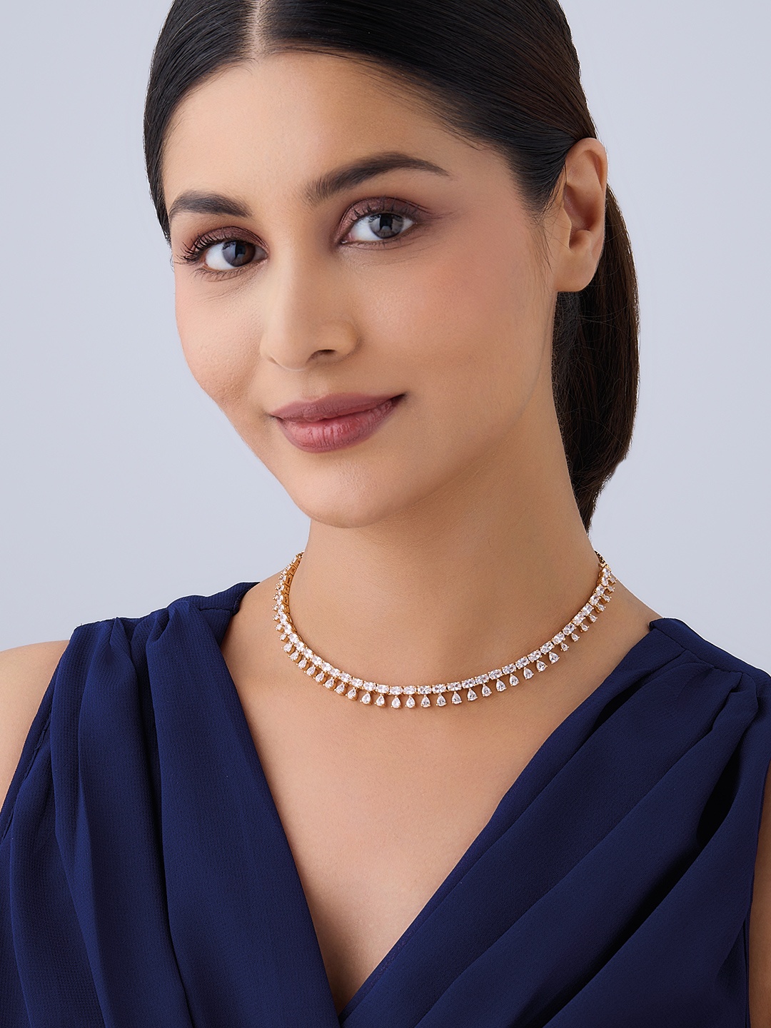 

Kushal's Fashion Jewellery Gold Plated Cubic Zirconia Studded Necklace