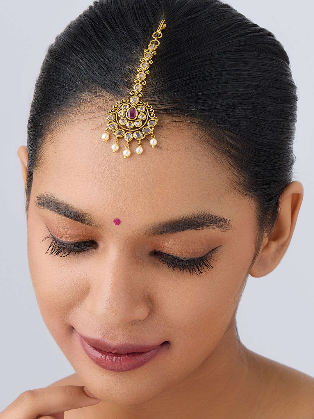 

Kushal's Fashion Jewellery Gold-Plated Antique Maangtikka