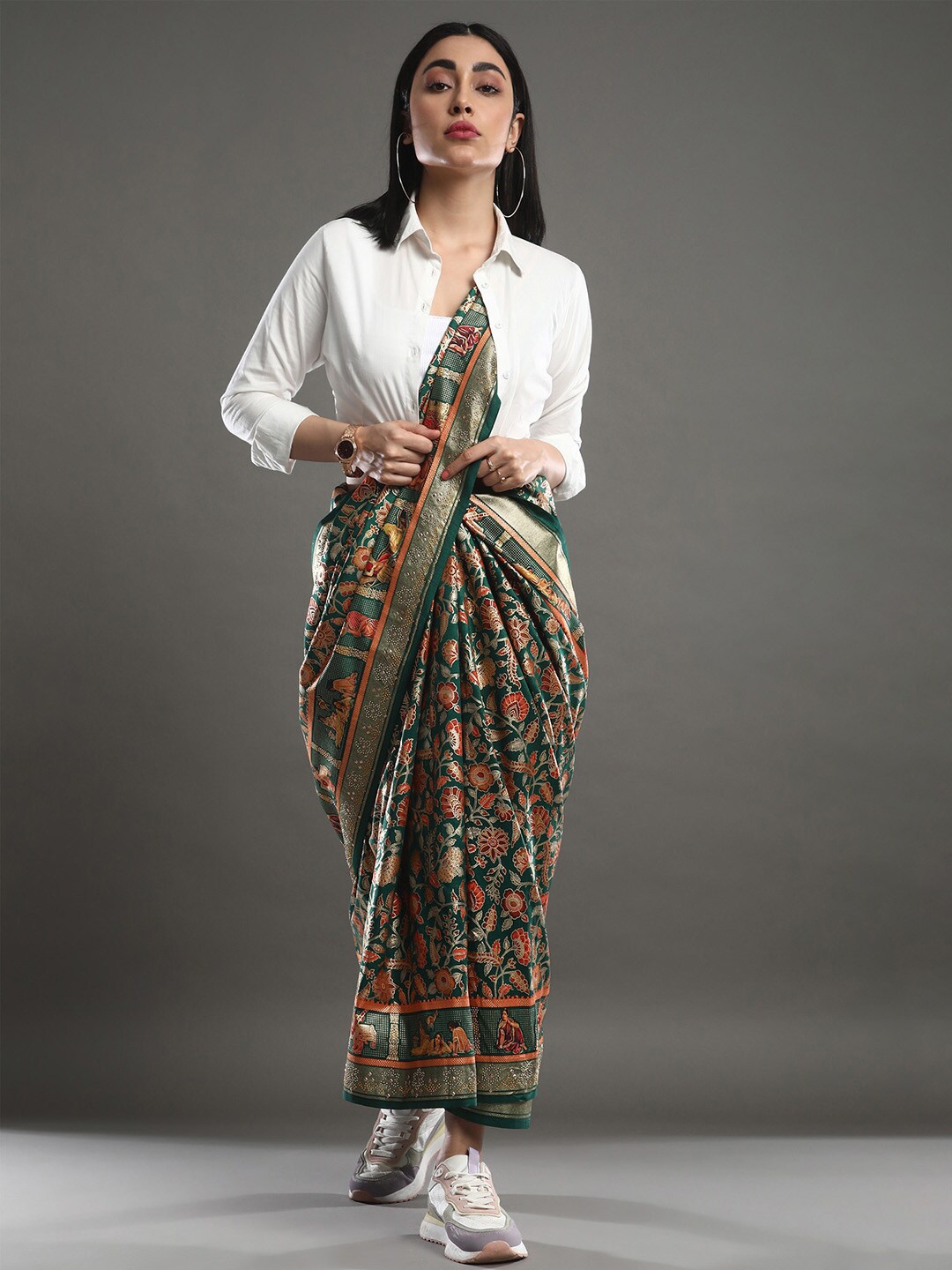 

Mitera Teal Green Ethnic Motifs Printed Zari Banarasi Saree
