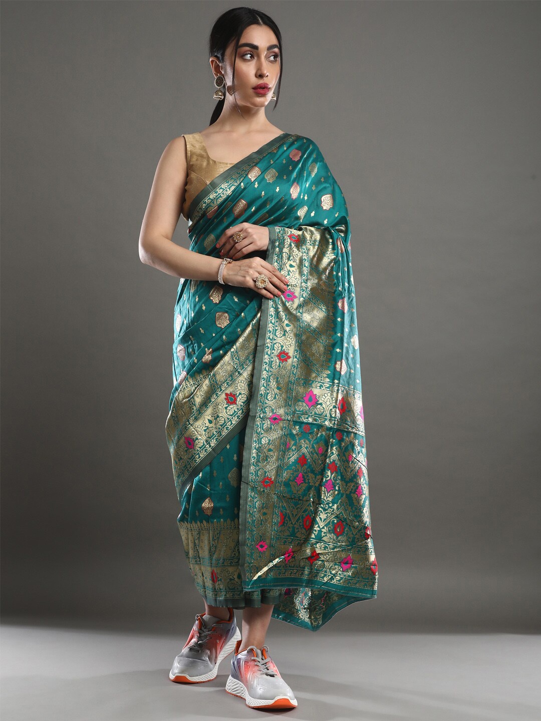 

Mitera Teal & Pink Ethnic Motifs Woven Design Zari Silk Blend Banarasi Saree