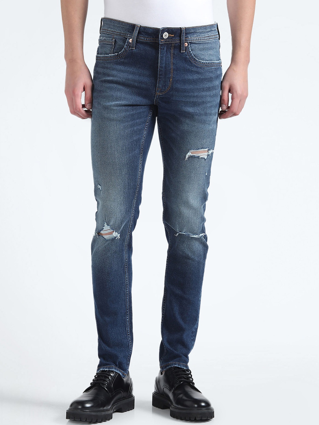 

Flying Machine Men Skinny Fit Mid-Rise Mildly Distressed Heavy Fade Stretchable Jeans, Blue