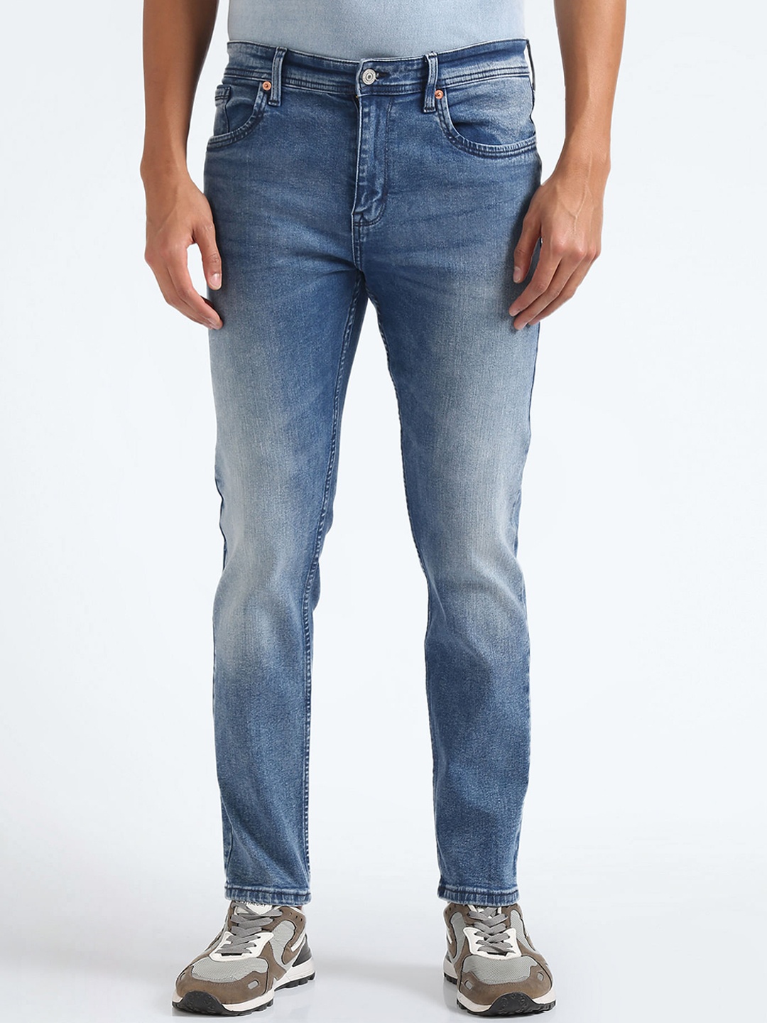 

Flying Machine Men Tapered Fit Mid-Rise Heavy Fade Stretchable Jeans, Blue
