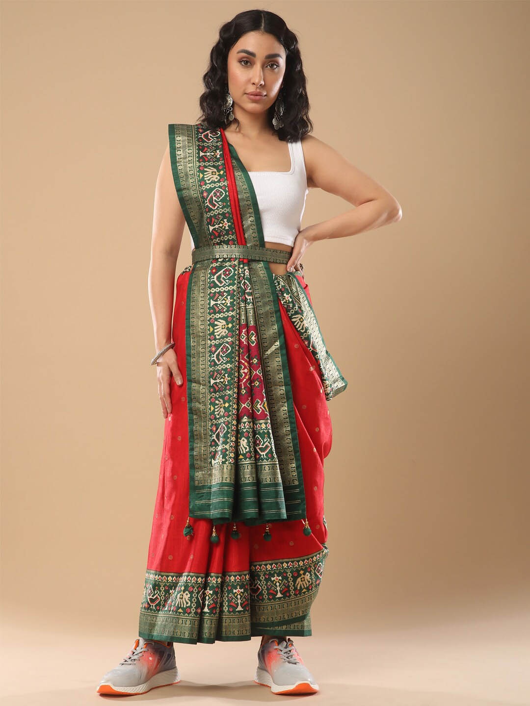 

Mitera Red Ethnic Motifs Woven Design Zari Patola Saree