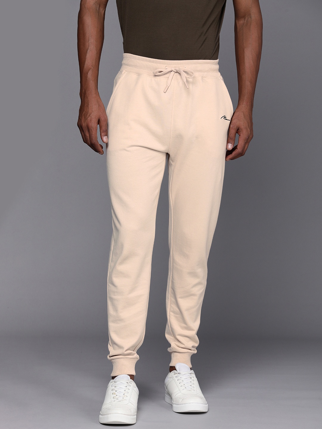 

boohooMAN Men Mid-Rise Solid Regular Fit Joggers, Cream