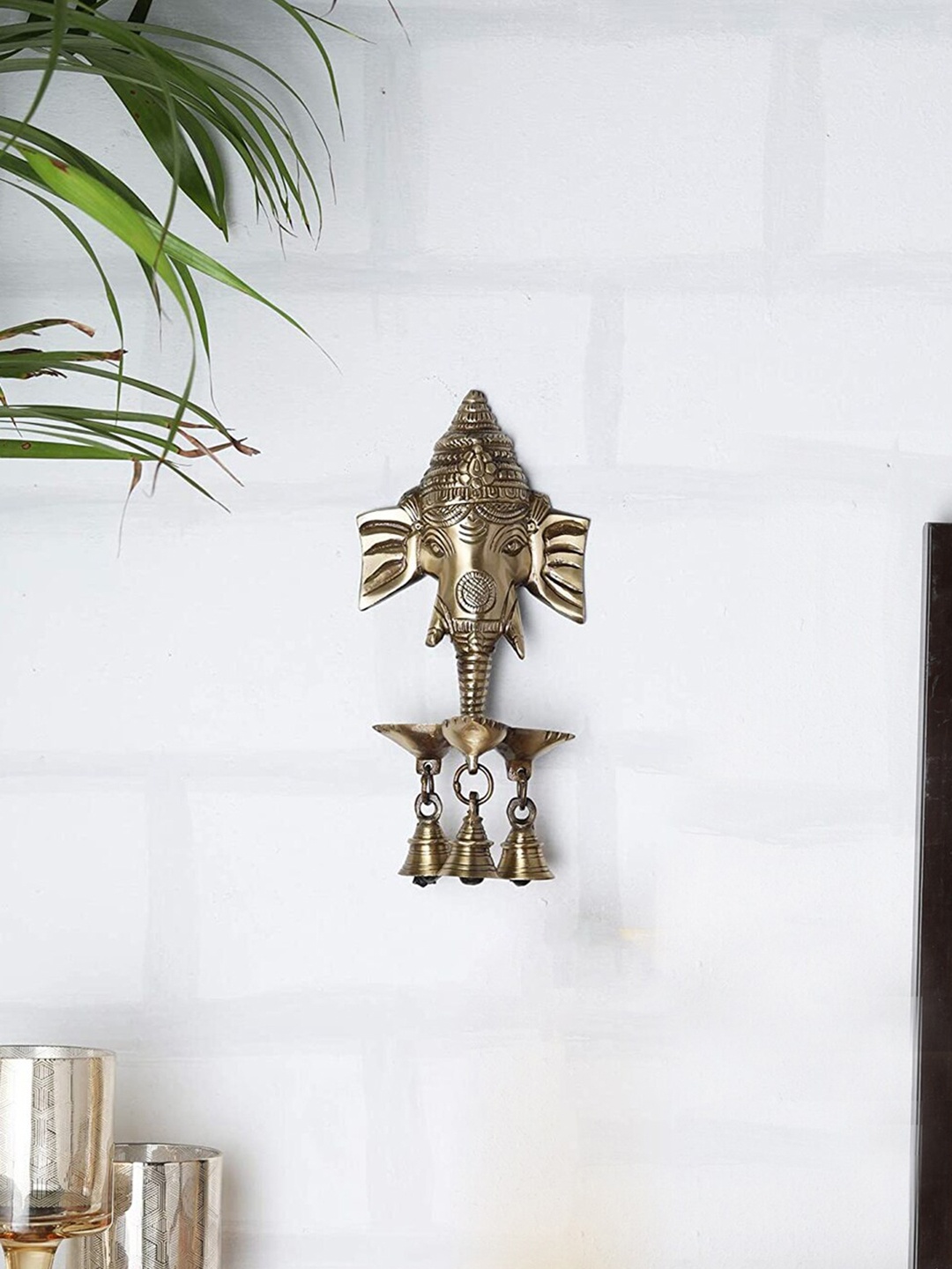 Two Moustaches Gold Toned Ganesha Wall Hanging Diya with Bells