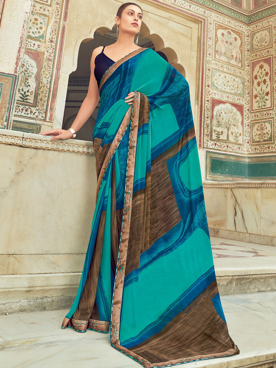 

SANSKAR Abstract Printed Georgette Saree, Turquoise blue