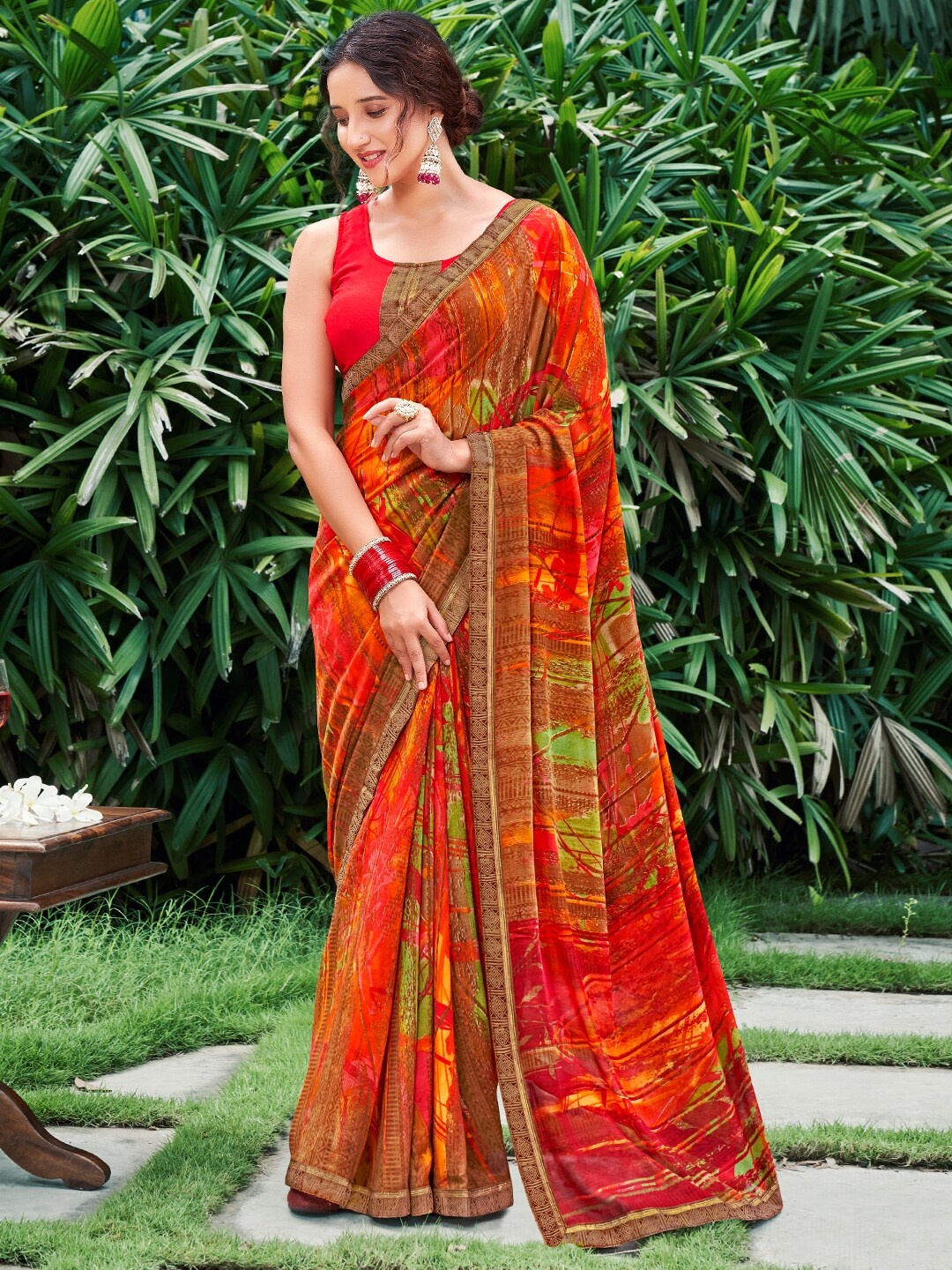 

SANSKAR Printed Georgette Saree, Orange