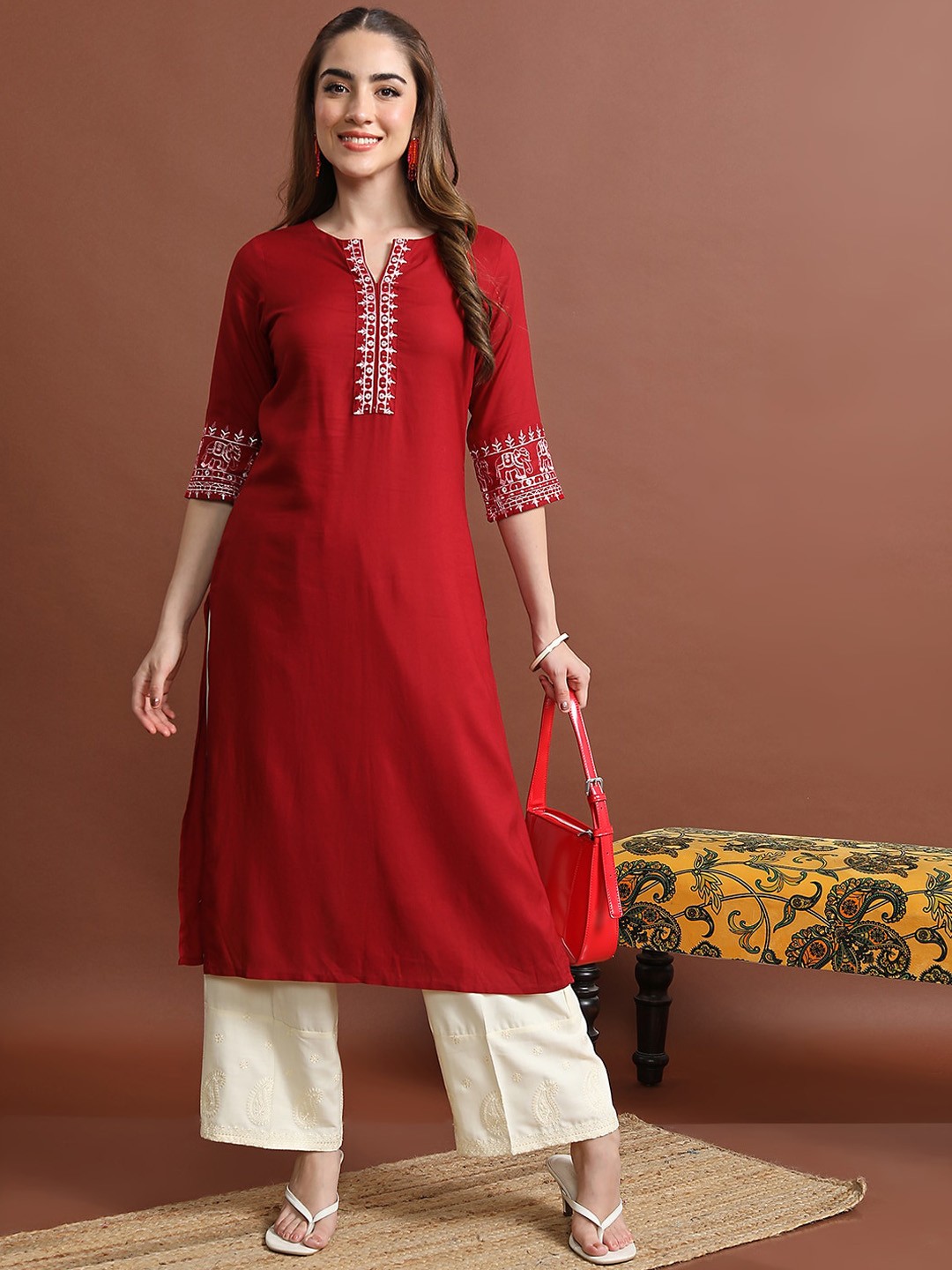 

Vishudh Red Ethnic Motifs Yoke Design Thread Work Straight Kurta