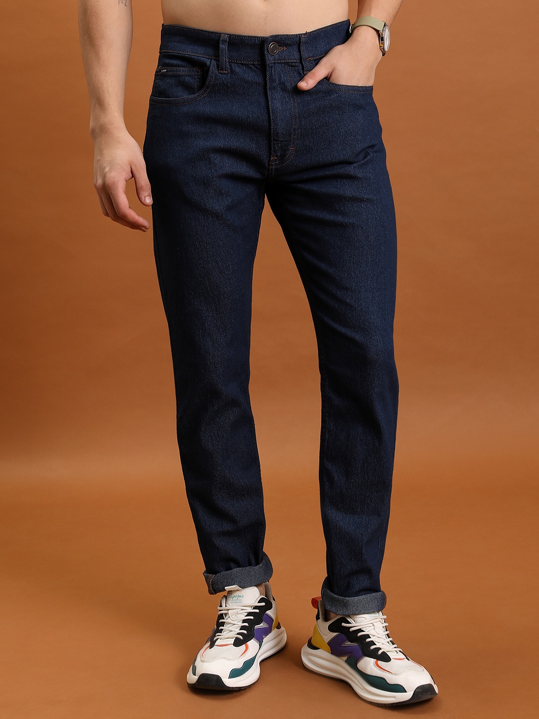 

HIGHLANDER Men Tapered Fit Mid-Rise Clean Look Stretchable Jeans, Blue