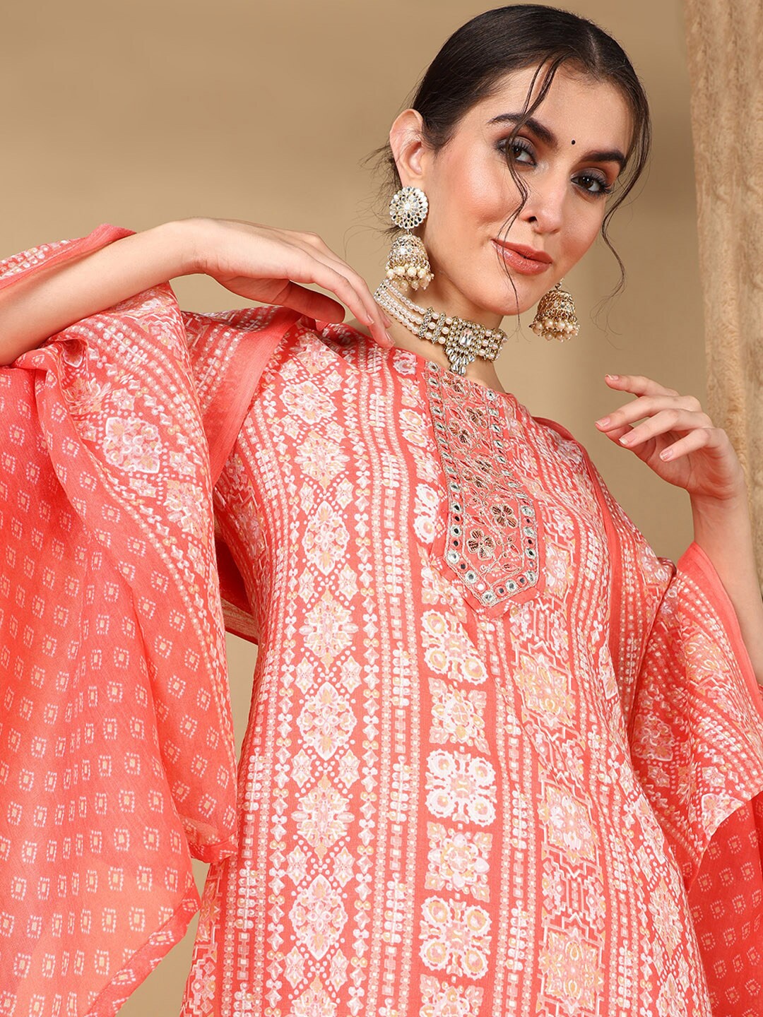 

AHIKA Floral Printed Thread Work Kurta With Trousers & Dupatta, Peach