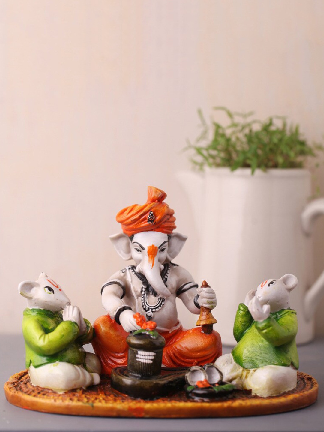 

eCraftIndia White & Green Lord Ganesha Performing Shiva Pooja Idol Showpiece