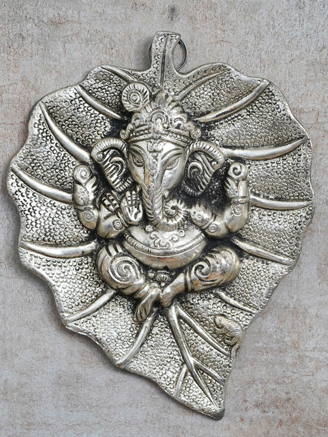

eCraftIndia Silver Lord Ganesha On Leaf Metal Idol Showpiece