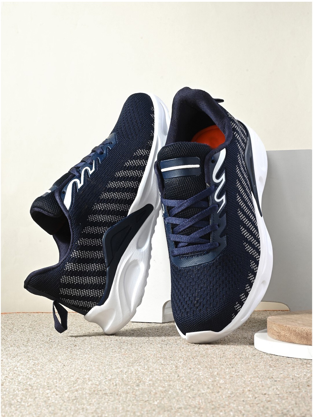 

The Roadster Lifestyle Co. Men Navy Blue & White Flyknit Textile Running Shoes