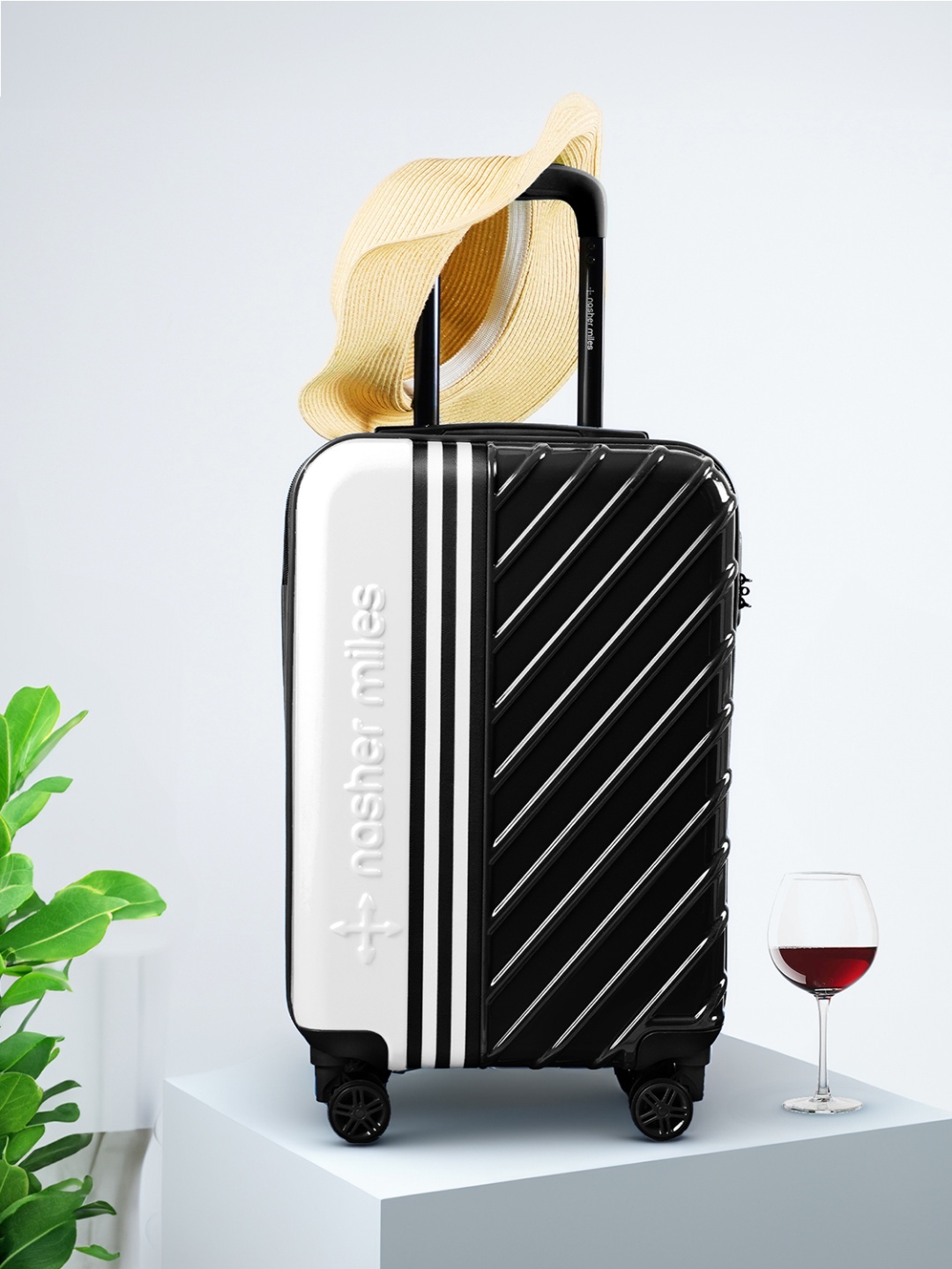 

Nasher Miles Vegas Hard-Sided Polycarbonate Cabin Black White Trolley Bag - 20Inch 55cm