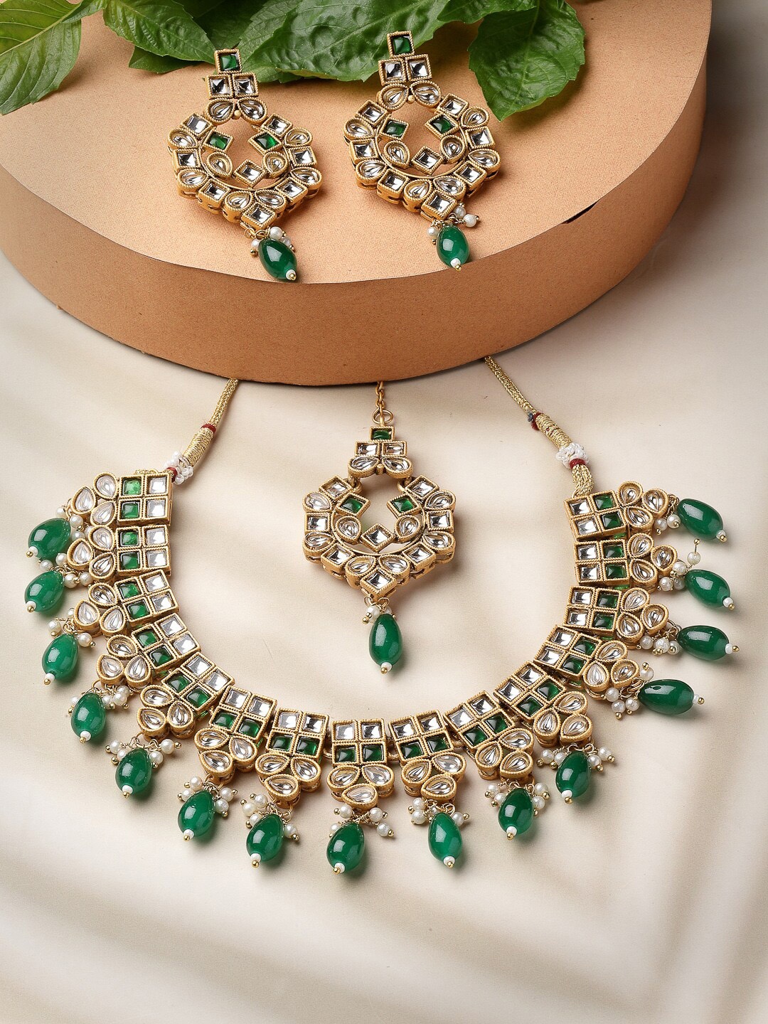 

ADIVA Gold-Plated Kundan Stone Studded Necklace and Earrings With Maang Tika