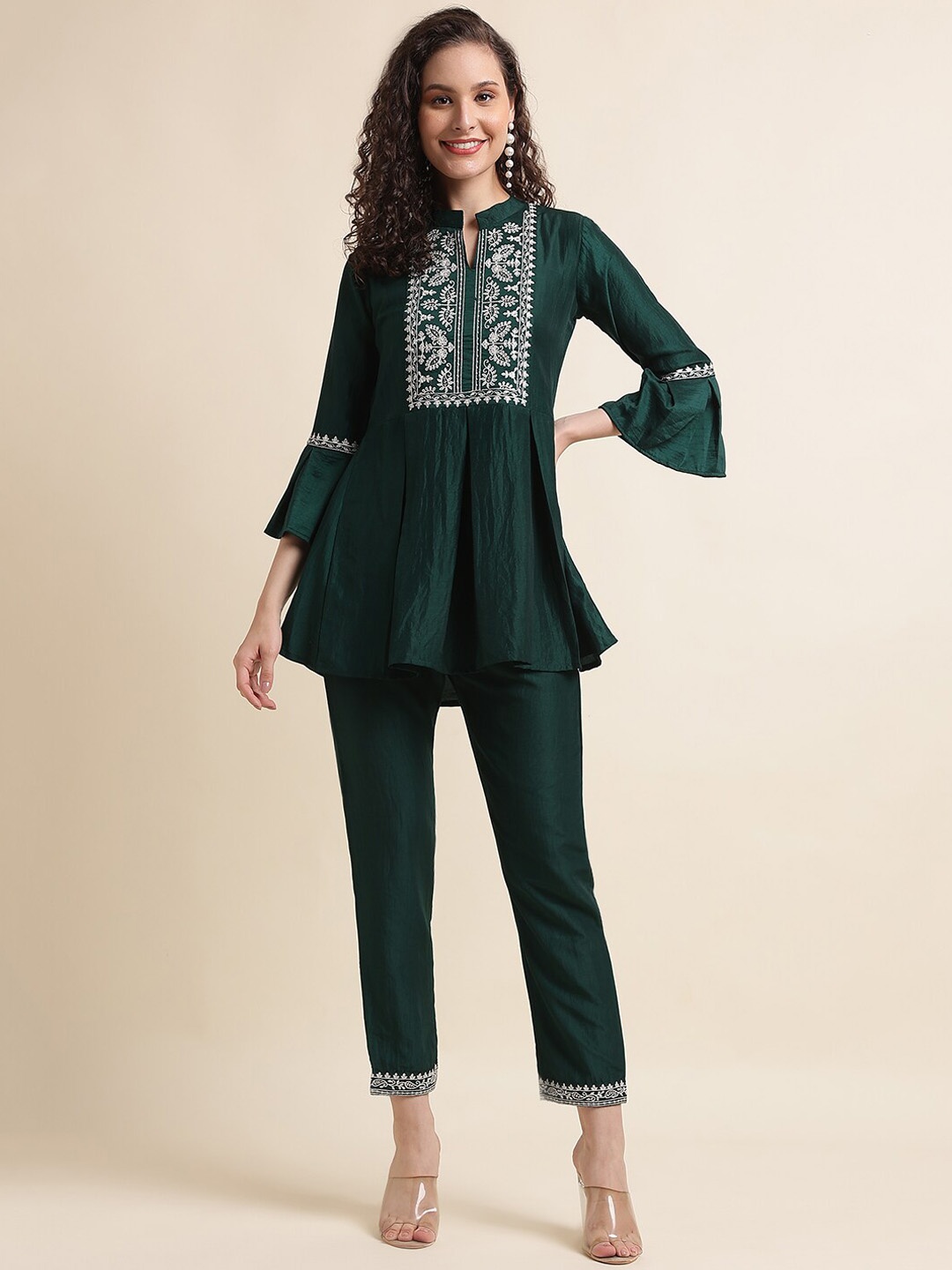 

Sangria Green Ethnic Motifs Embroidered Kurti & Trousers