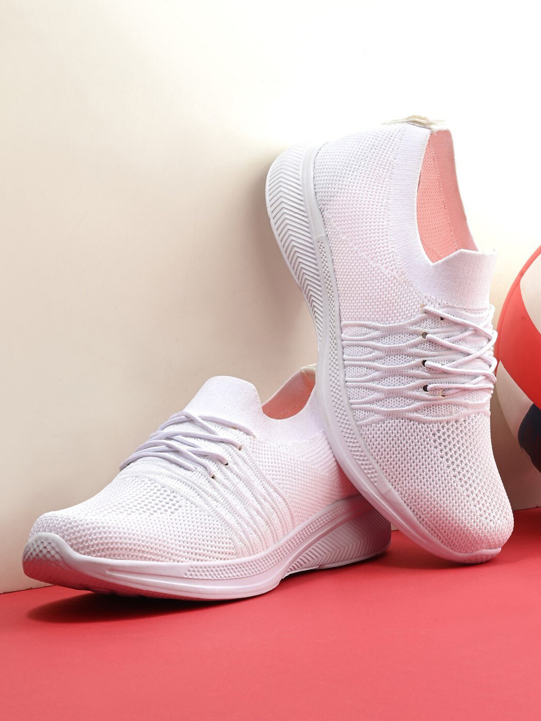 

The Roadster Lifestyle Co. Men White Textured Slip-On Running Shoes