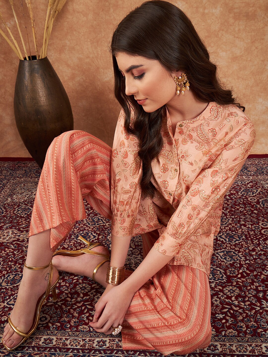 

Sangria Coral-Color Ethnic Motifs Printed Kurti With Trousers