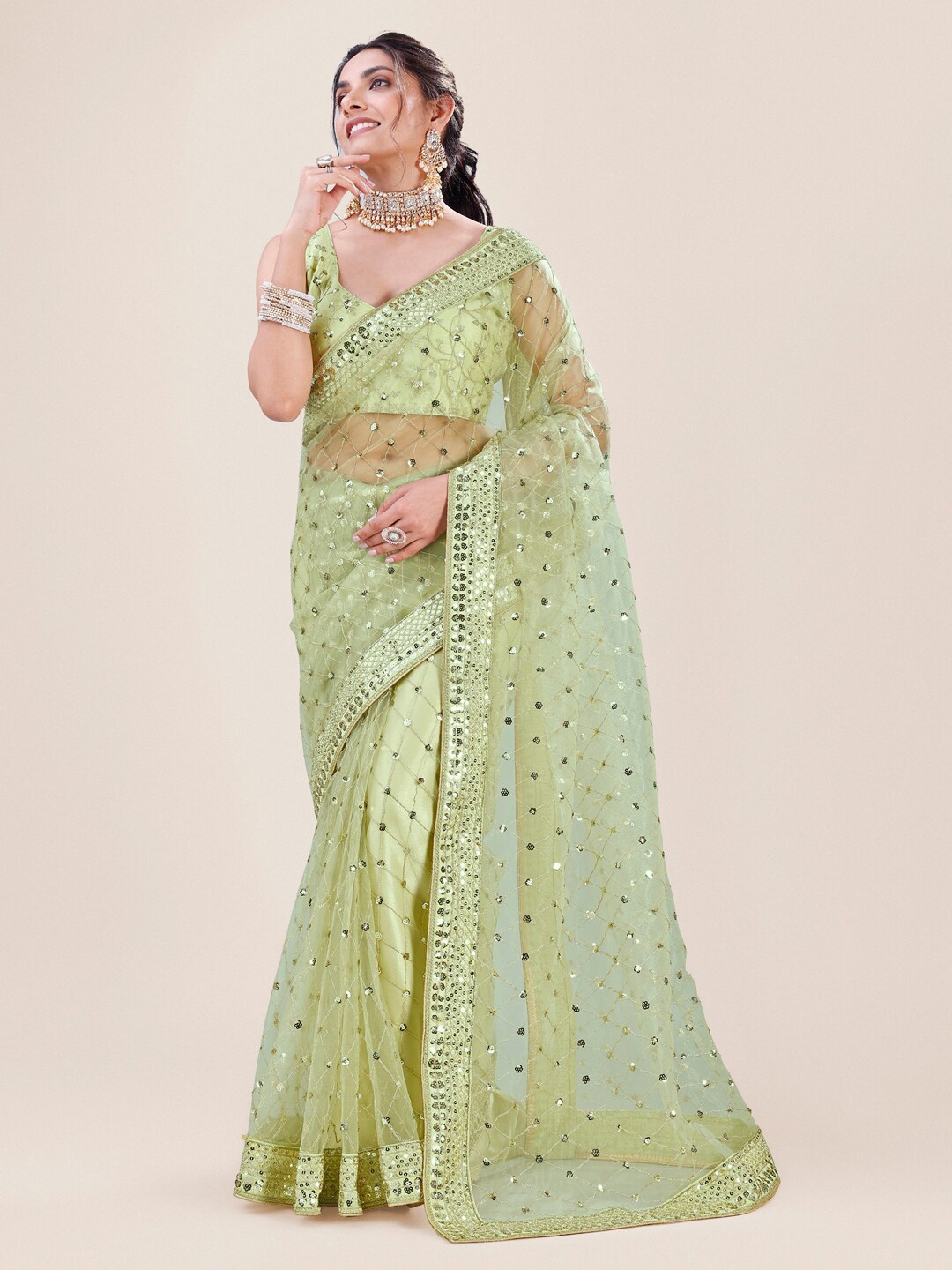 

Roykals Green Embellished Sequinned Net Fusion Saree