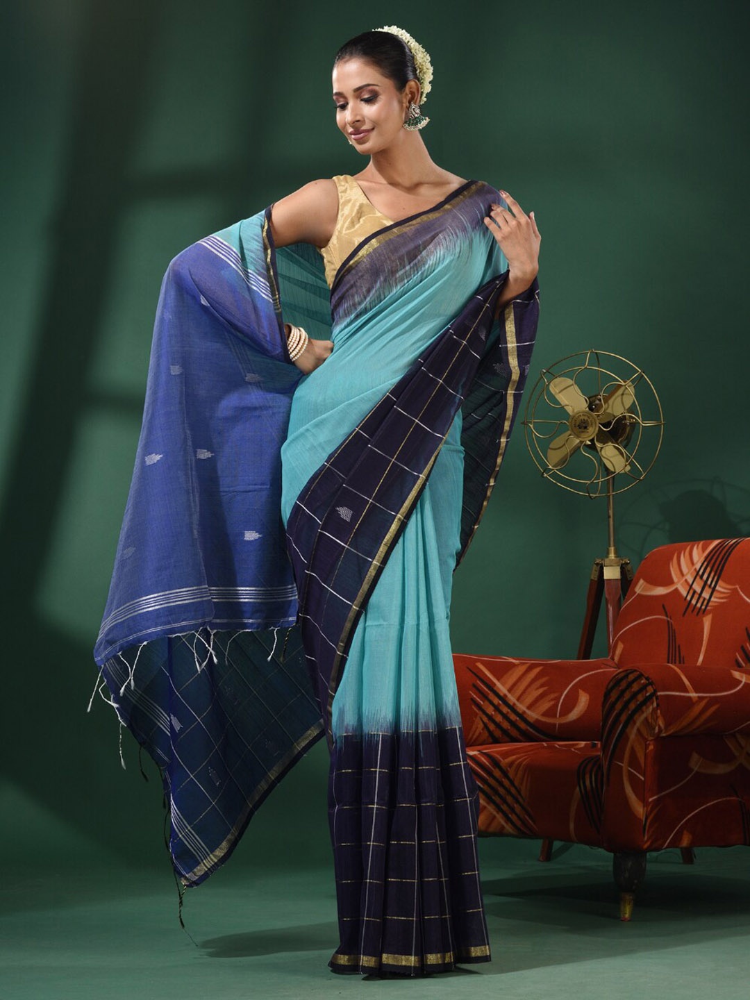 

Charukriti Ethnic Motifs Woven Design Zari Ikat Saree, Sea green