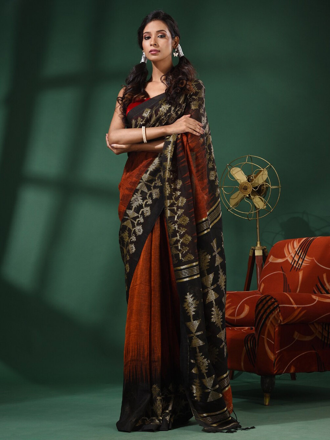 

Charukriti Ethnic Motifs Woven Design Zari Pure Linen Saree, Rust