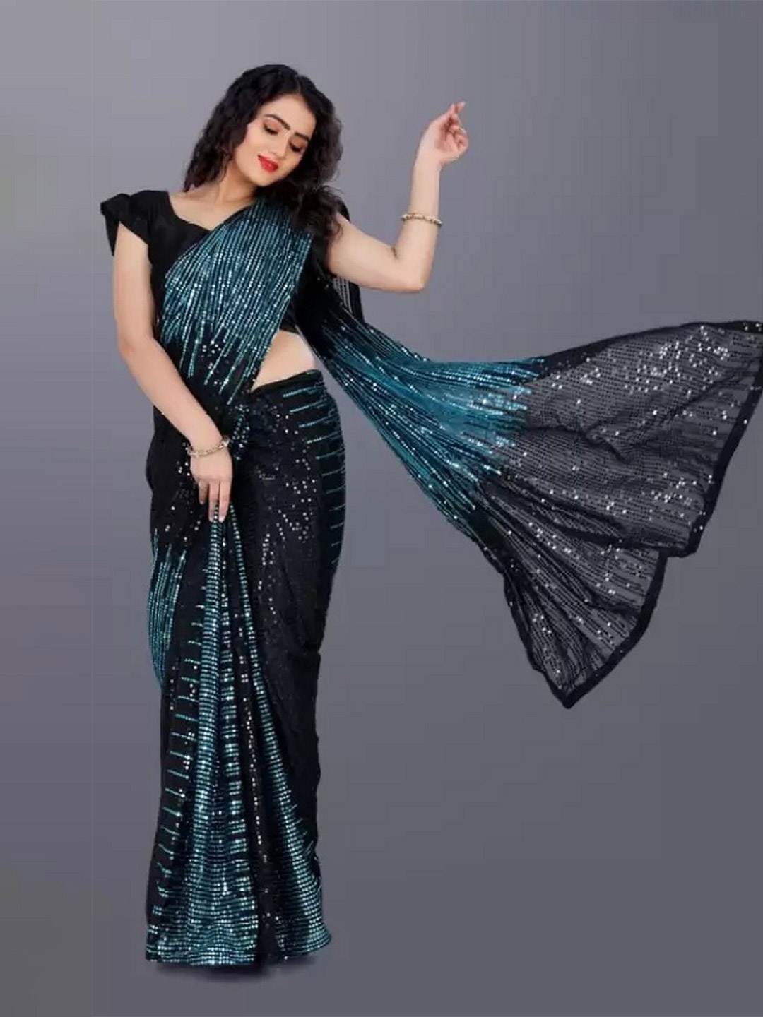 

APNISHA Embellished Sequinned Pure Georgette Saree, Turquoise blue