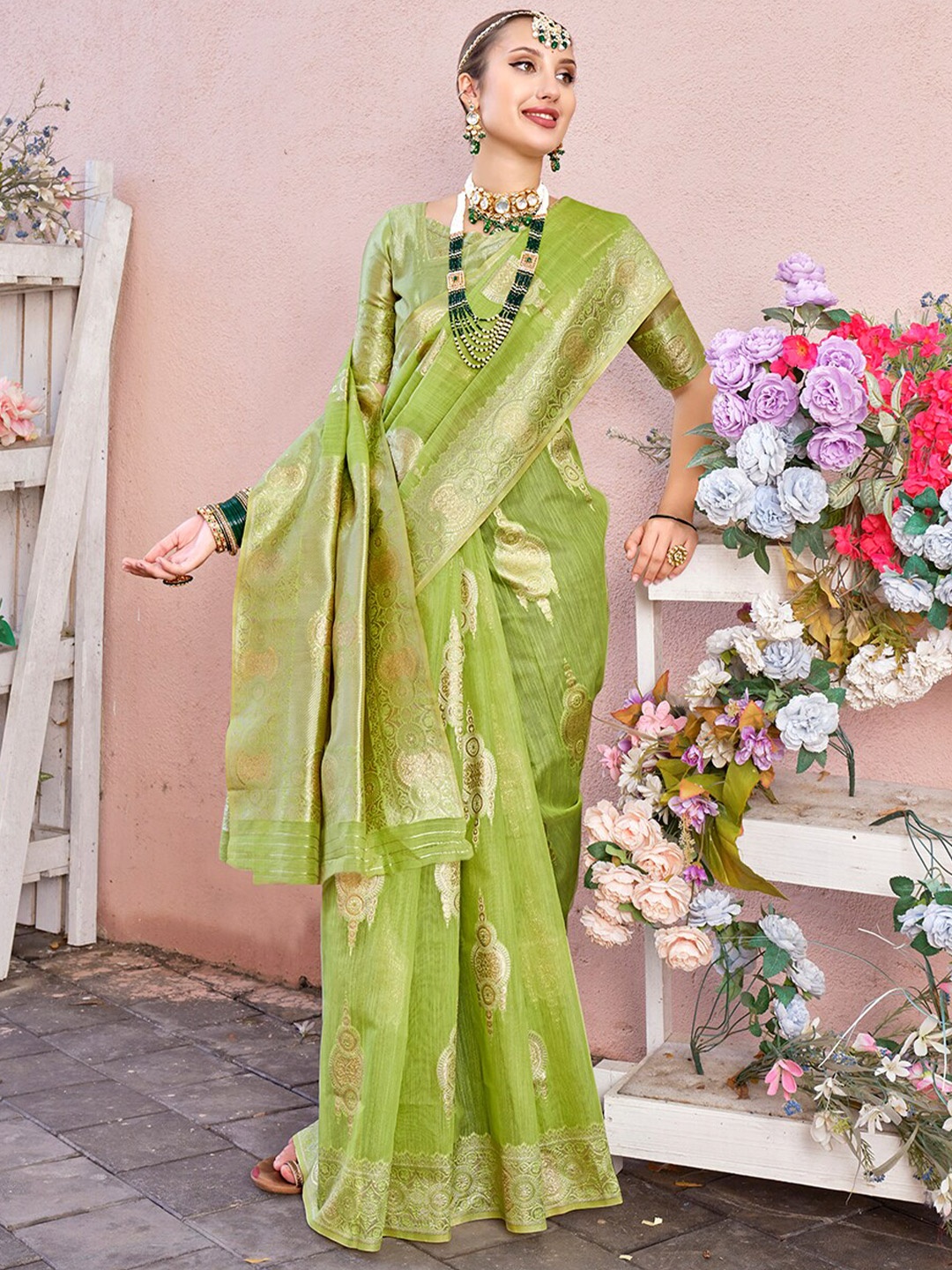 

Anouk Lime Green Ethnic Motifs Woven Design Zari Saree