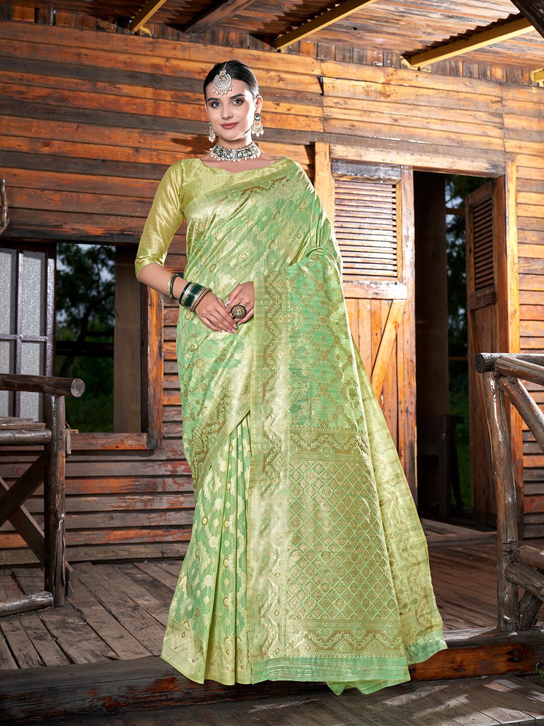 

Anouk Green Ethnic Motifs Woven Design Zari Saree