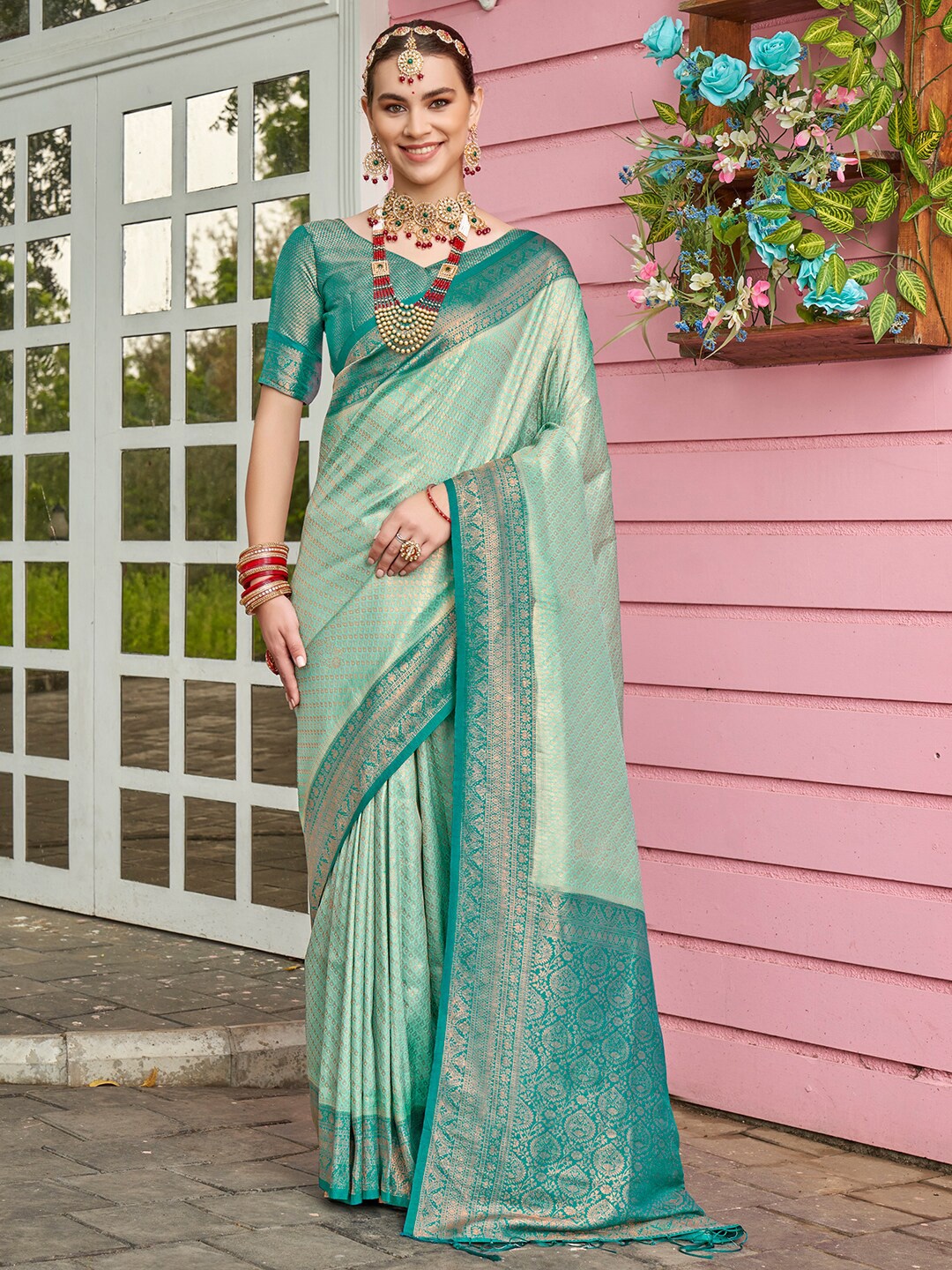 

Anouk Turquoise Blue & Green Ethnic Motifs Woven Design Zari Art Silk Saree