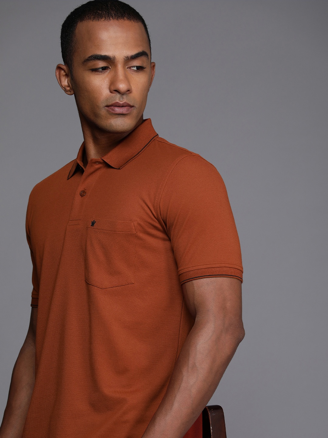 

Louis Philippe Solid Polo Collar Pocket T-shirt, Rust